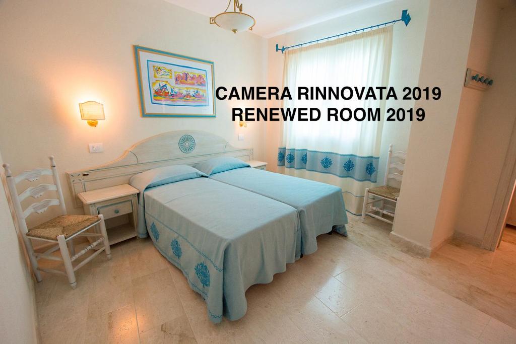 Postel nebo postele na pokoji v ubytování Hotel Riviera