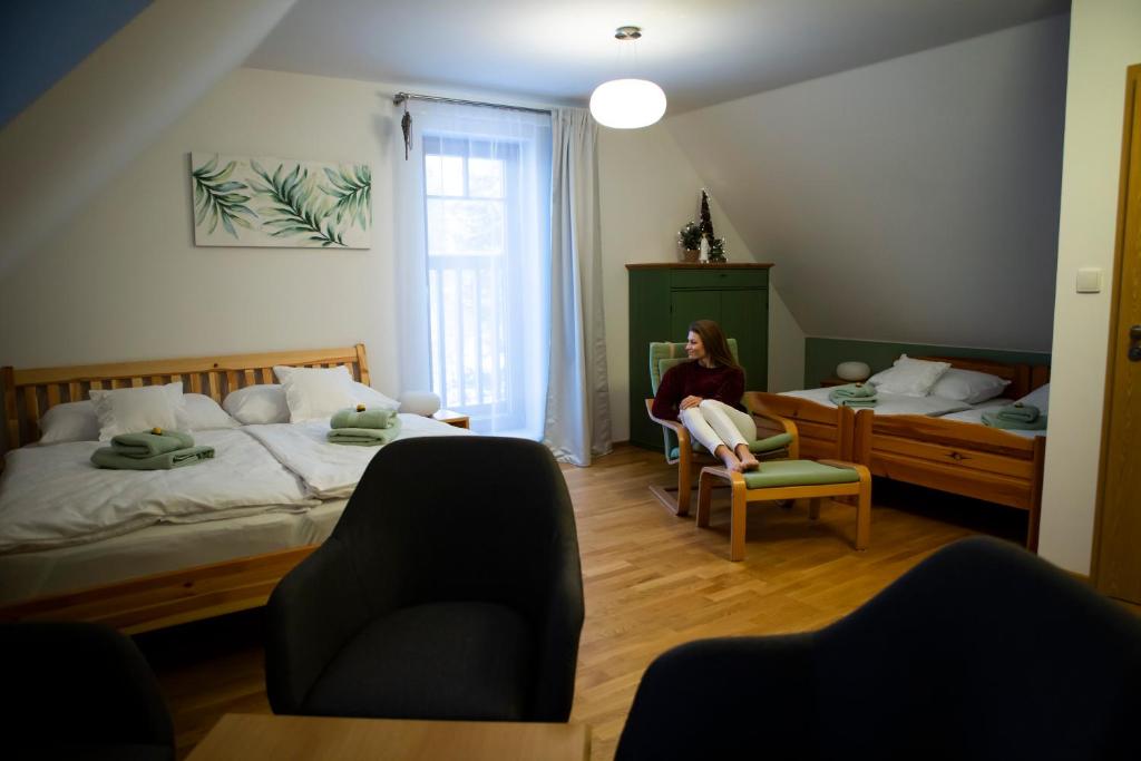 Postel nebo postele na pokoji v ubytování Vila Apalucha49 Čeladná - 12 osob