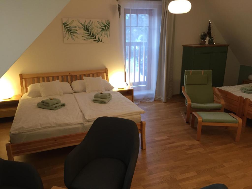 Postel nebo postele na pokoji v ubytování Vila Apalucha49 Čeladná - 12 osob