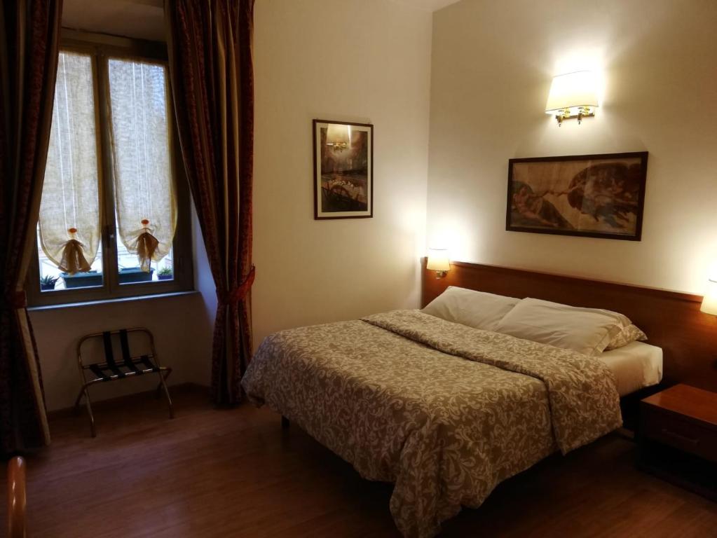 Posteľ alebo postele v izbe v ubytovaní Domus Appia 154 B&B