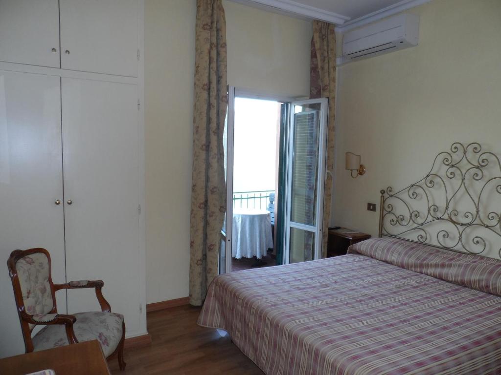 Letto o letti in una camera di Albergo Lucia Pagnanelli