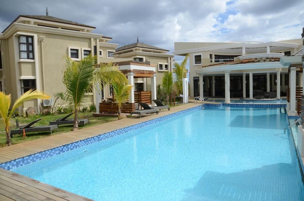 Bazén v ubytování Villasun Luxury Apartments & Villas nebo v jeho okolí