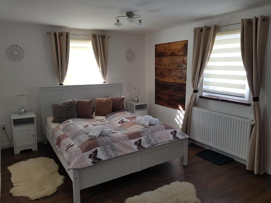 Posteľ alebo postele v izbe v ubytovaní Alexandra Appartement