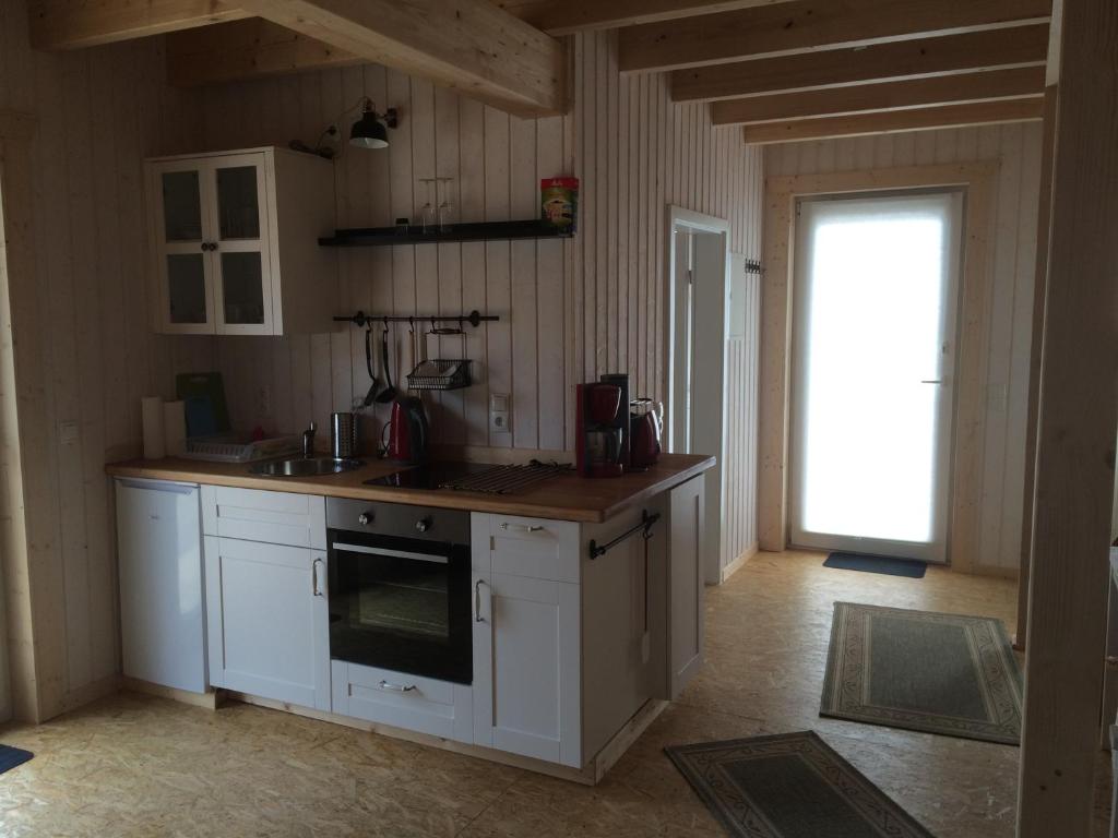 Kuchyň nebo kuchyňský kout v ubytování Ferienwohnungen im Schwedenstil
