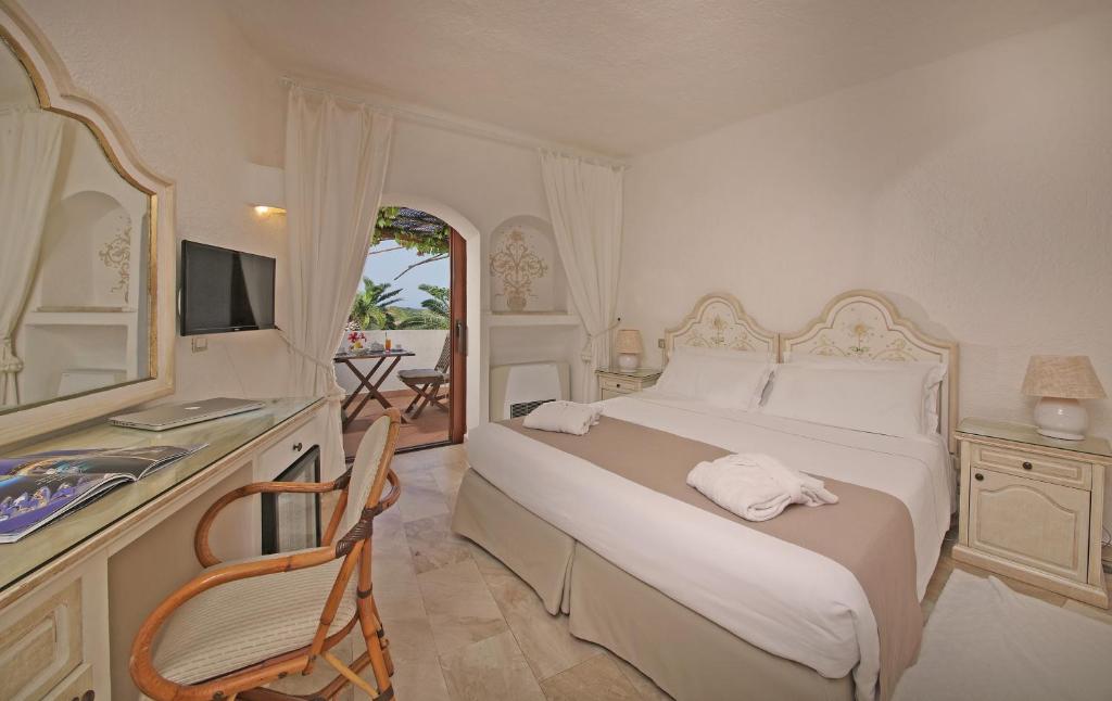 Postel nebo postele na pokoji v ubytování Hotel Balocco