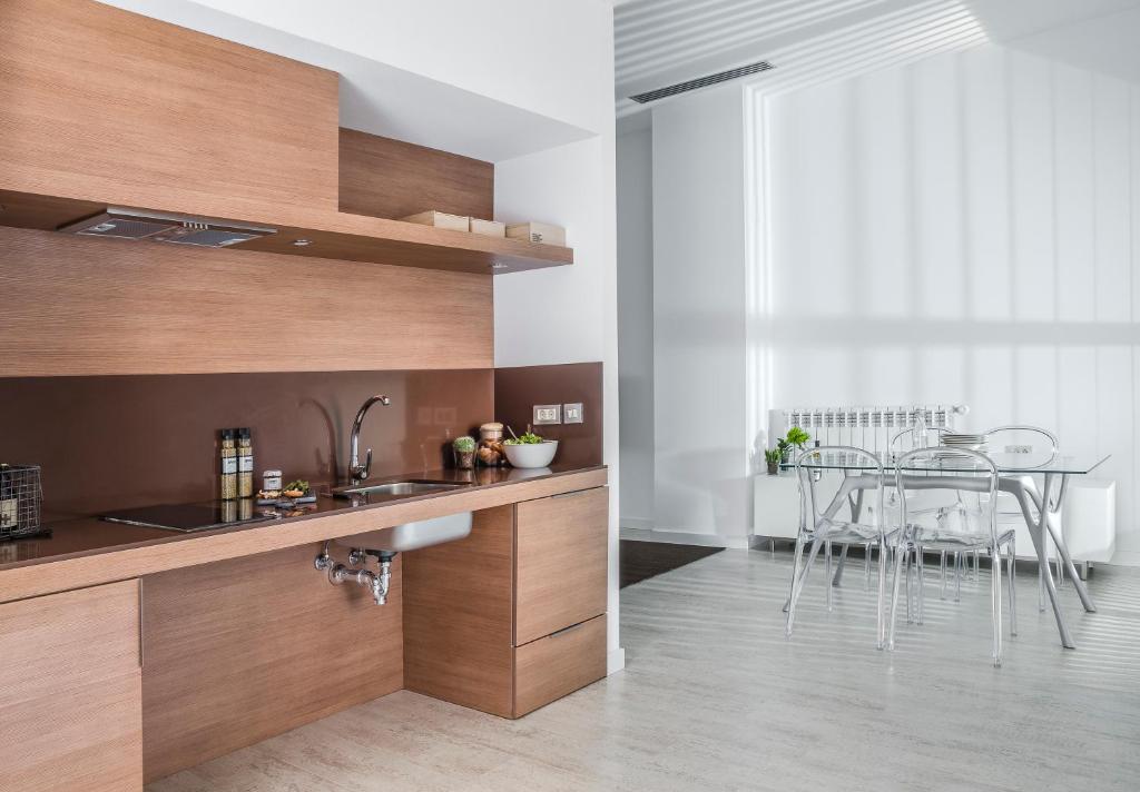 Kuchyň nebo kuchyňský kout v ubytování Eric Vökel Boutique Apartments - Atocha Suites