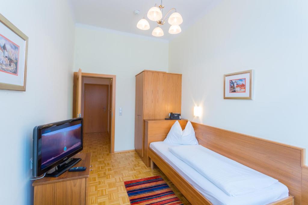 Postel nebo postele na pokoji v ubytování Hotel Kindler 2,0 Self-Check-In