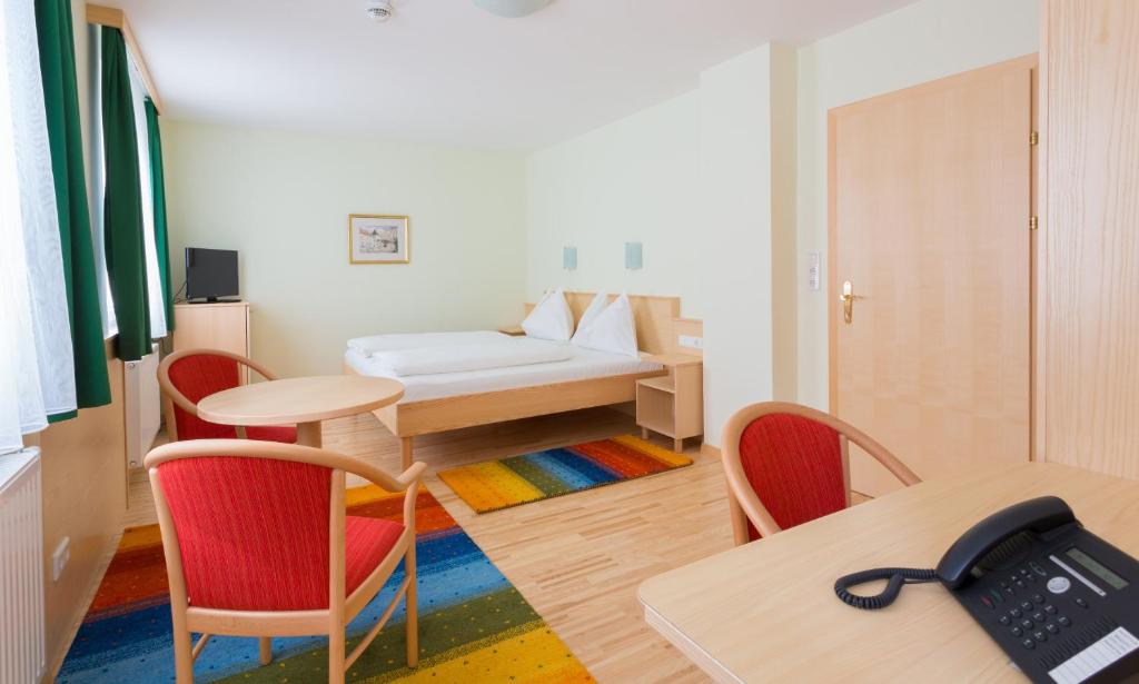 TV a/nebo společenská místnost v ubytování Hotel Kindler 2,0 Self-Check-In