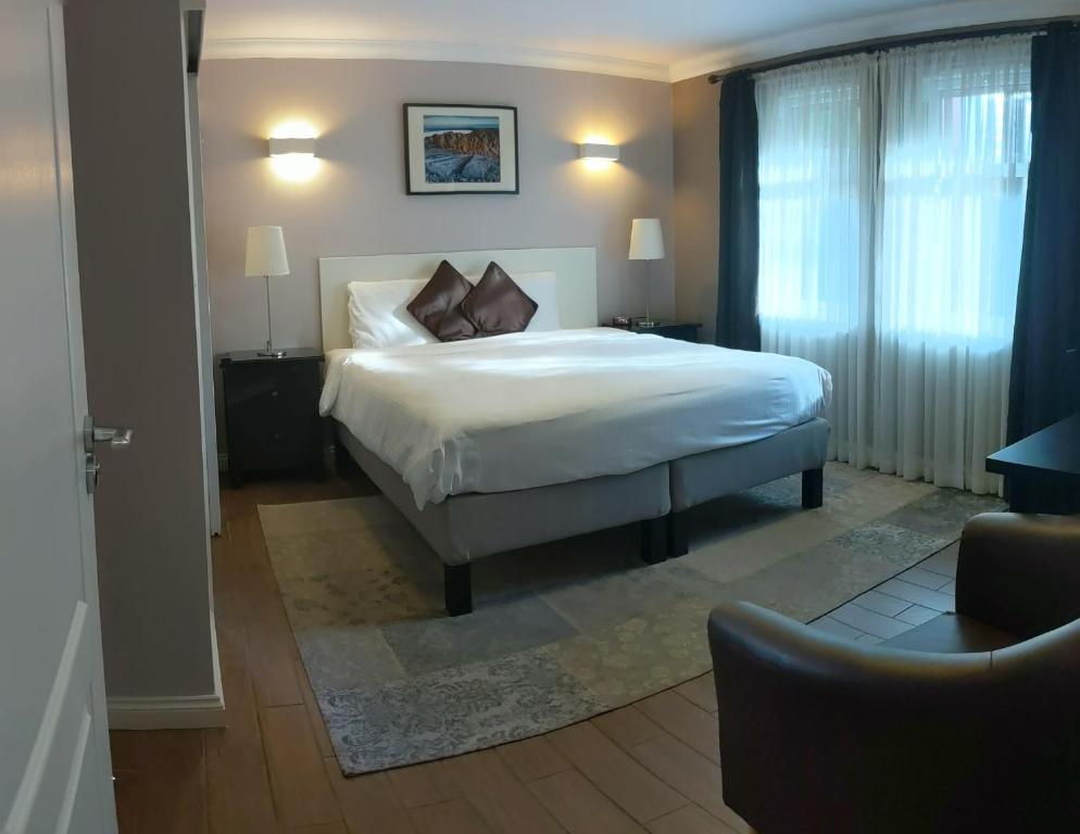 Postel nebo postele na pokoji v ubytování MacLean Guest House