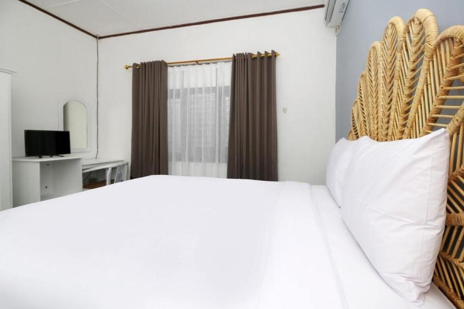 TV a/nebo společenská místnost v ubytování Rarem Bed & Breakfast