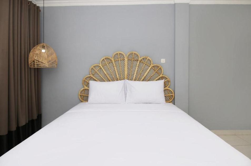 Postel nebo postele na pokoji v ubytování Rarem Bed & Breakfast