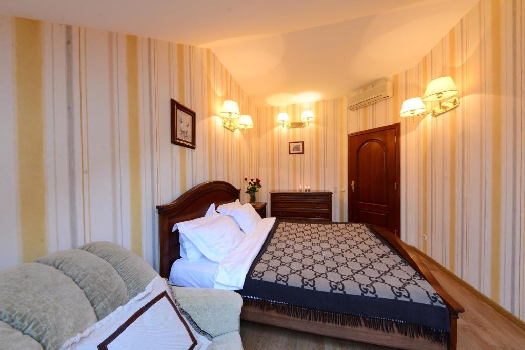 Postel nebo postele na pokoji v ubytování Boutique Apart-Hotel Sherborne