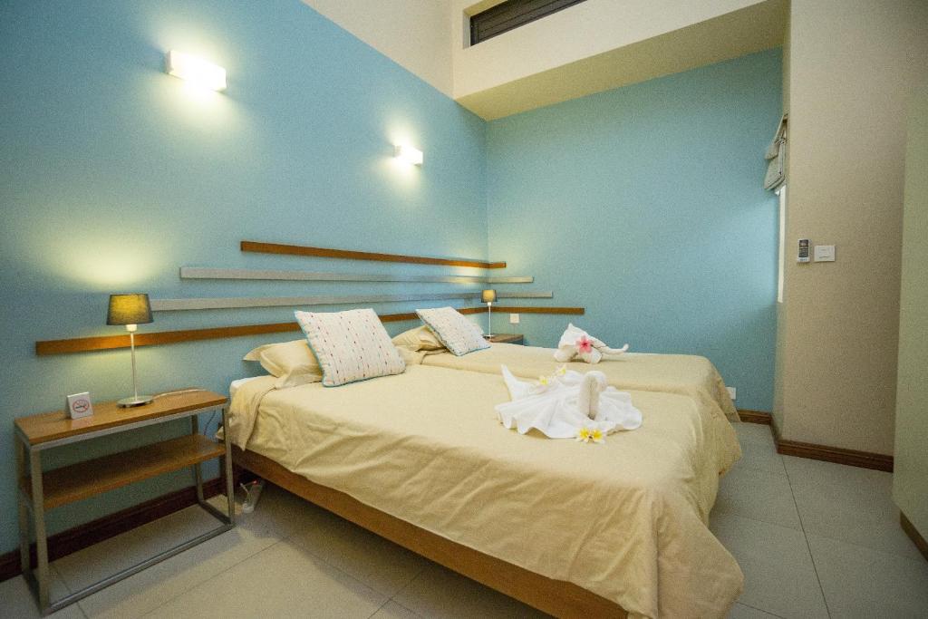 Postel nebo postele na pokoji v ubytování Villasun Luxury Apartments & Villas