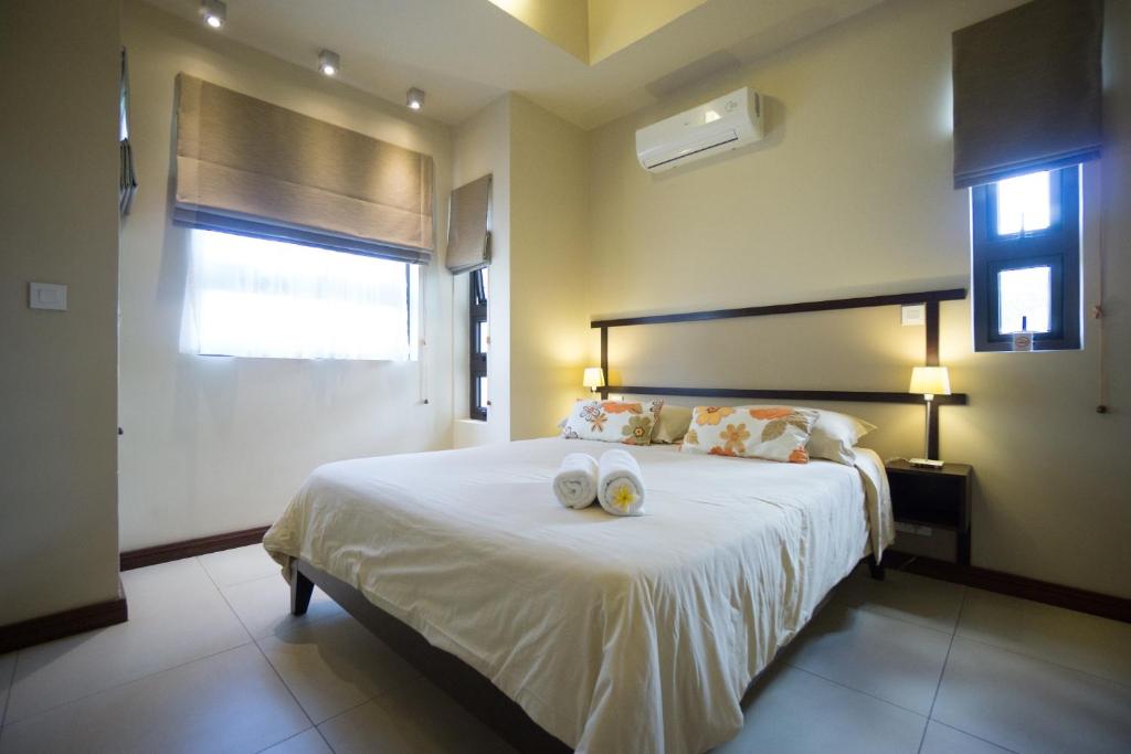 Postel nebo postele na pokoji v ubytování Villasun Luxury Apartments & Villas