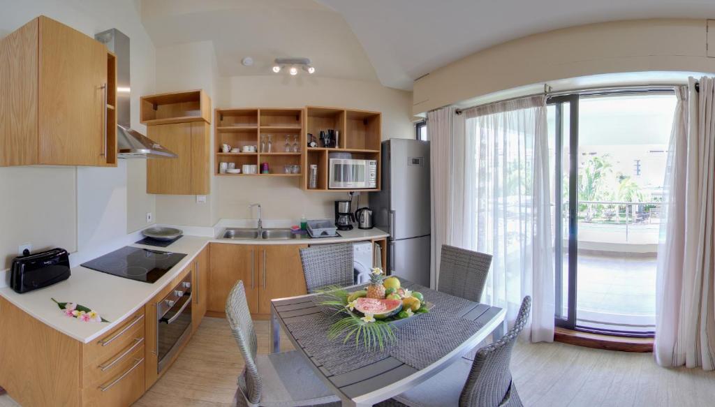 Kuchyň nebo kuchyňský kout v ubytování Villasun Luxury Apartments & Villas