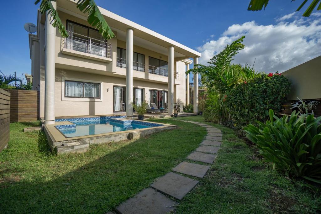 Bazén v ubytování Villasun Luxury Apartments & Villas nebo v jeho okolí