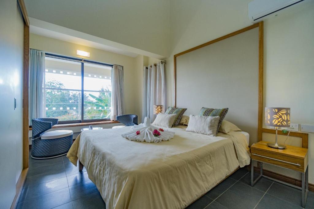 Postel nebo postele na pokoji v ubytování Villasun Luxury Apartments & Villas