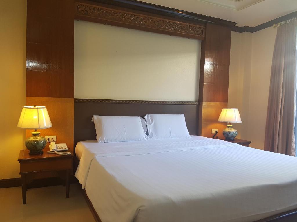 Letto o letti in una camera di Phi Phi Hotel