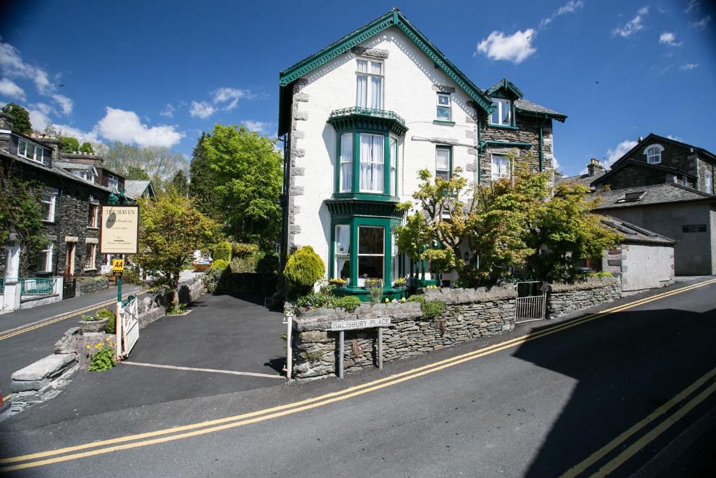 a house on the side of a street at The Haven in Windermere