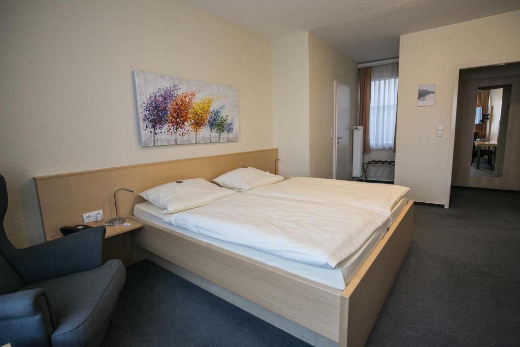 Postel nebo postele na pokoji v ubytování Bürgermeisterkapelle