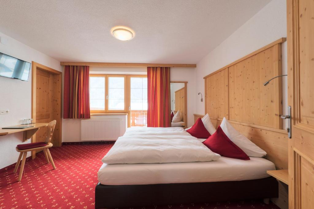 Postel nebo postele na pokoji v ubytování Bacherhof