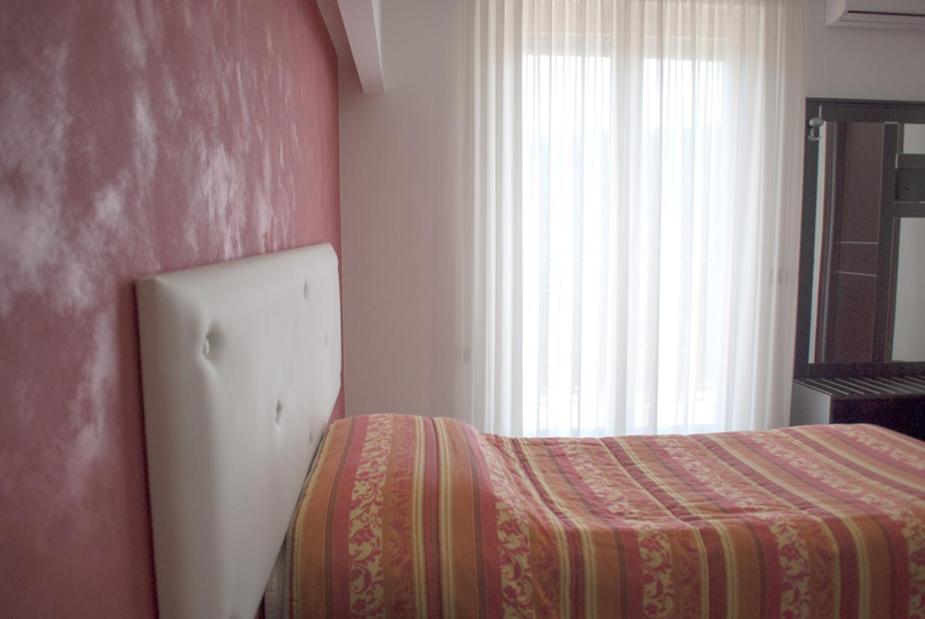 Postel nebo postele na pokoji v ubytování Hotel 660