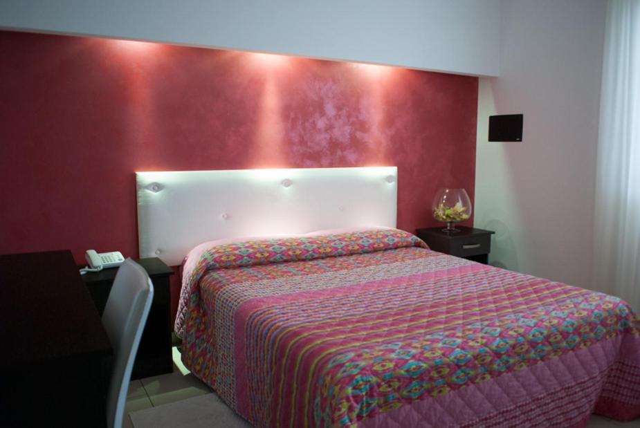 Postel nebo postele na pokoji v ubytování Hotel 660