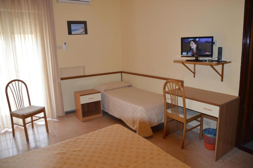 TV a/nebo společenská místnost v ubytování Hotel Virgilio