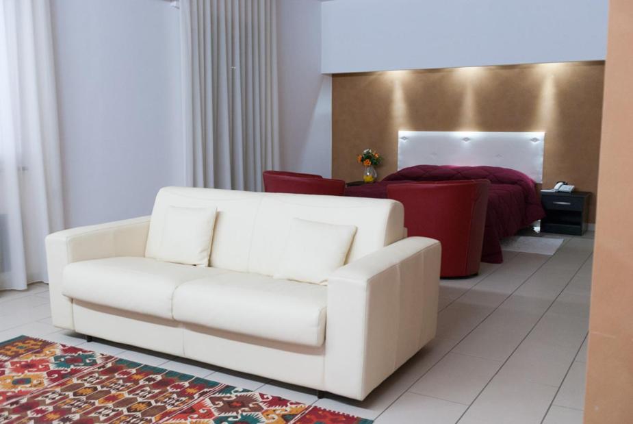 Postel nebo postele na pokoji v ubytování Hotel 660
