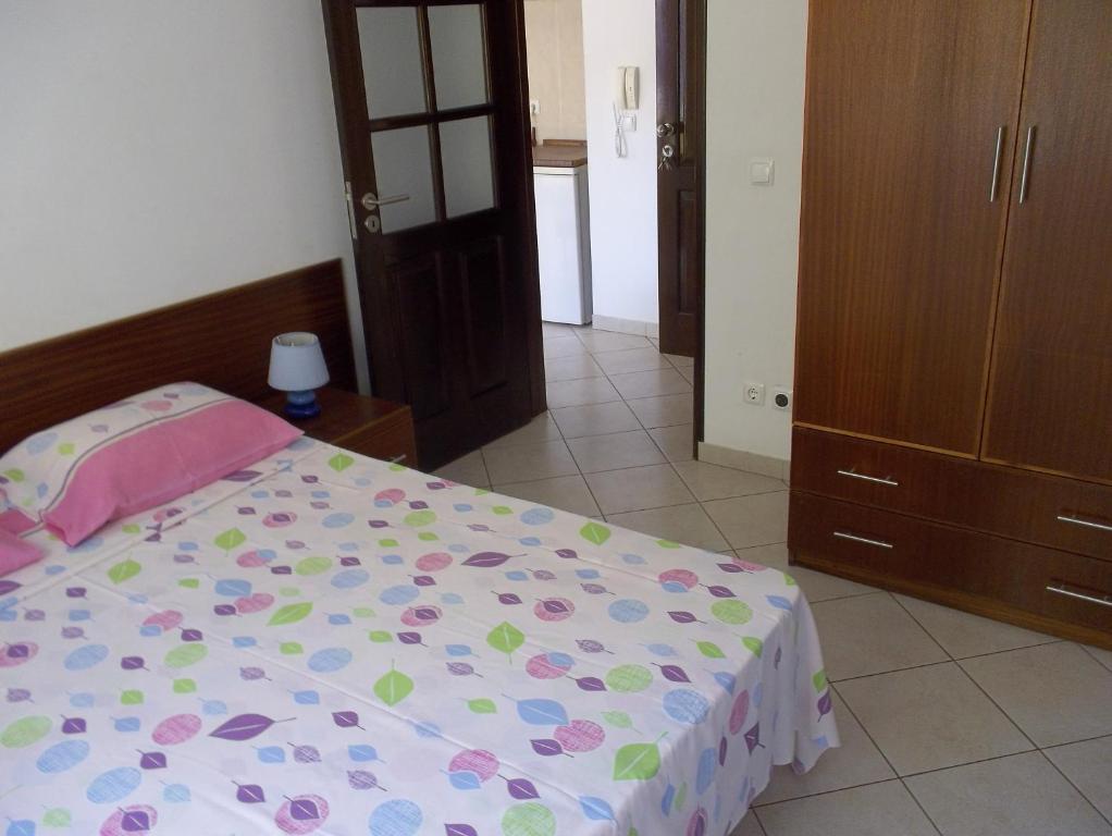 Postel nebo postele na pokoji v ubytování Basic Hotel