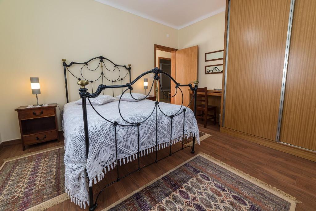 Postel nebo postele na pokoji v ubytování Quinta do Oeste