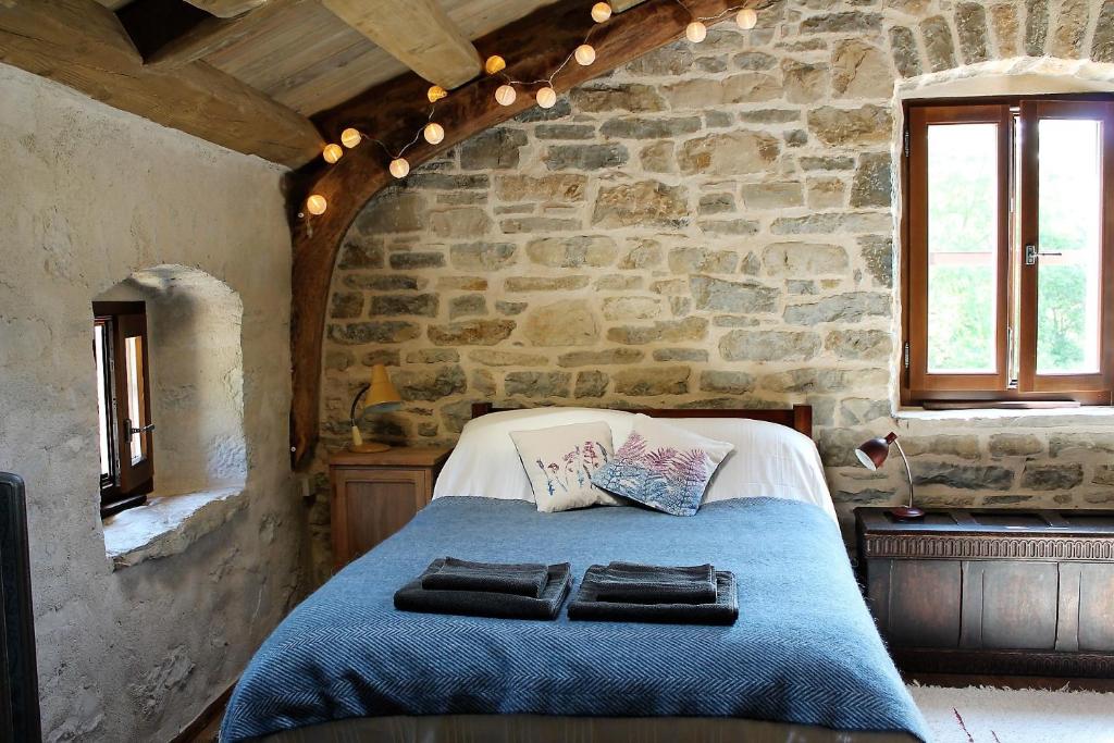 Postel nebo postele na pokoji v ubytování Bolara 60: the Guesthouse