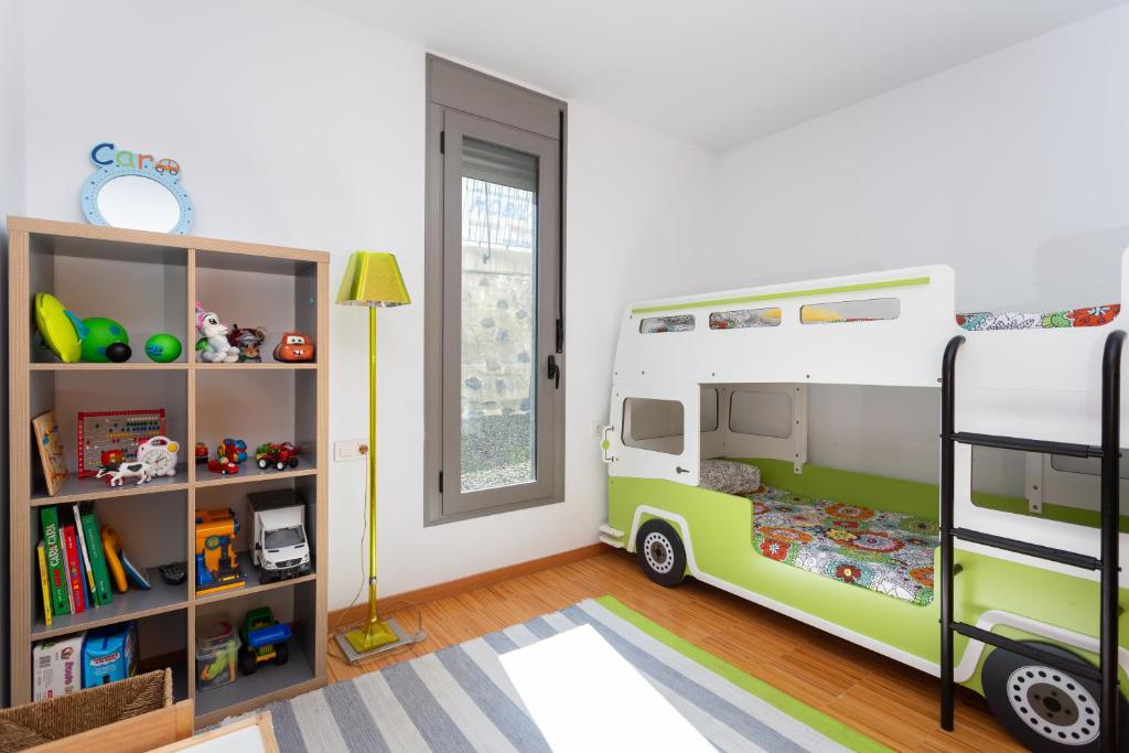 A bed or beds in a room at Home2Book Design Santa Úrsula Pool & Wifi