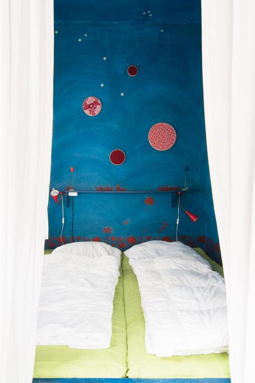 Letto o letti in una camera di Labyrinth Hostel Weimar