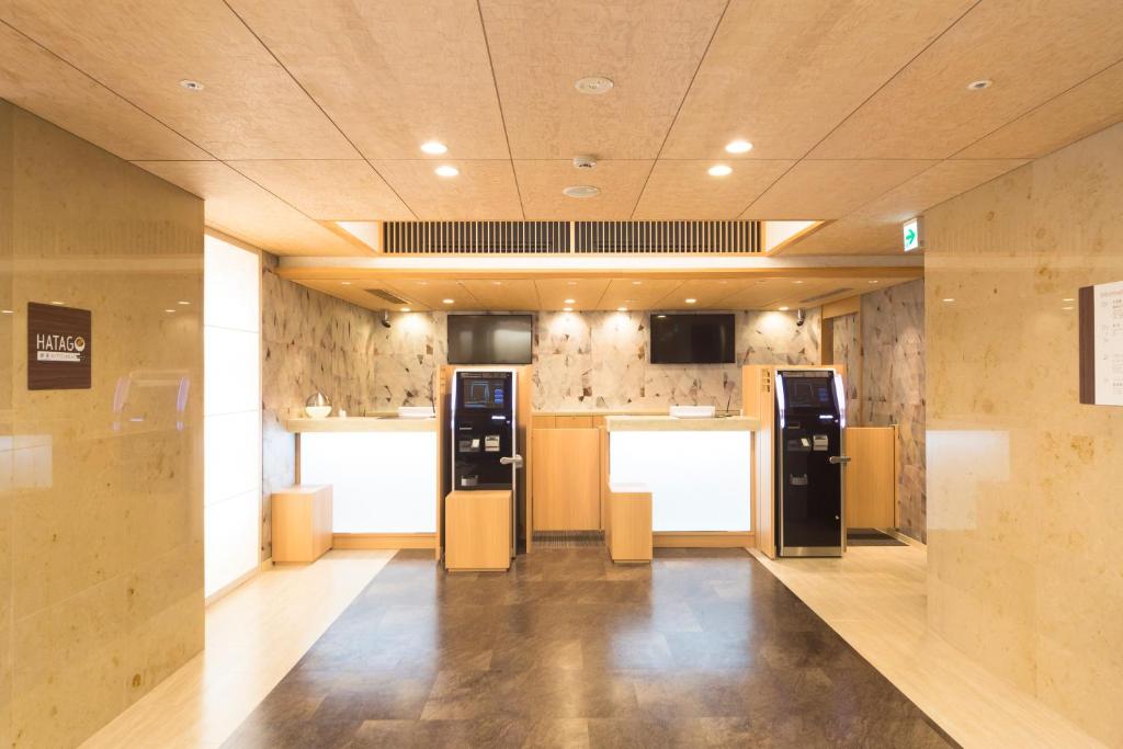 Kuchyň nebo kuchyňský kout v ubytování Myoujin-no-Yu Dormy Inn Premium Kanda