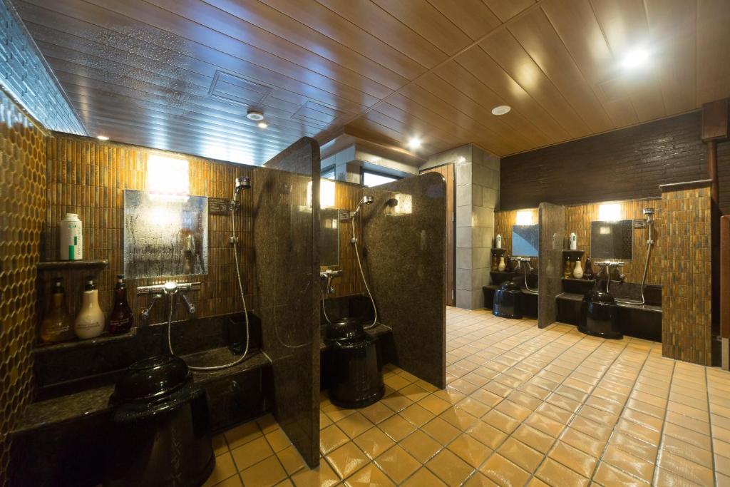 Koupelna v ubytování Myoujin-no-Yu Dormy Inn Premium Kanda