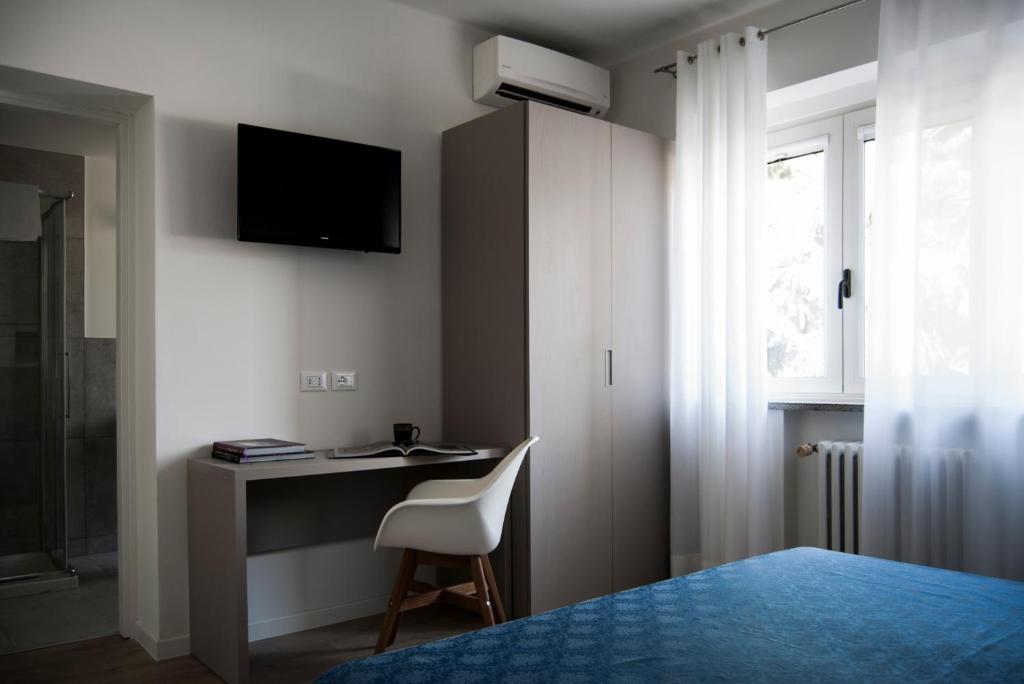 TV a/nebo společenská místnost v ubytování Hotel Oliva