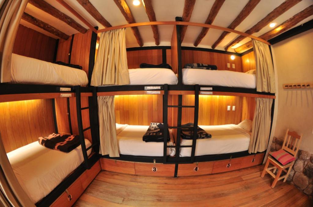 Letto o letti in una camera di Nao Victoria Hostel