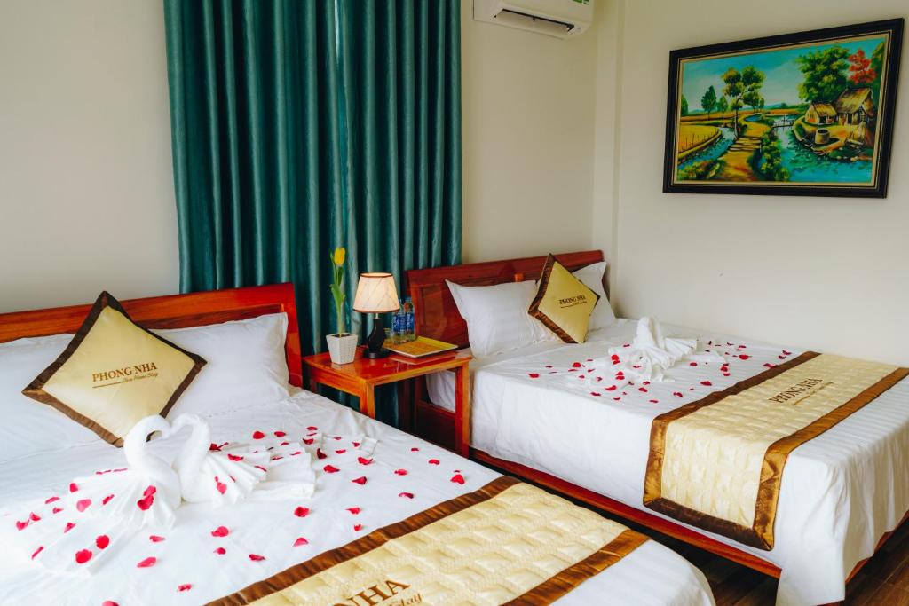 Lova arba lovos apgyvendinimo įstaigoje Phong Nha Love Homestay