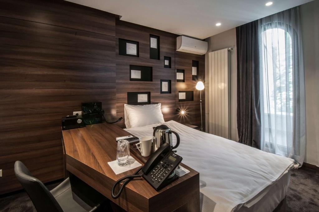 Postel nebo postele na pokoji v ubytování Best Western Premier Natalija Residence