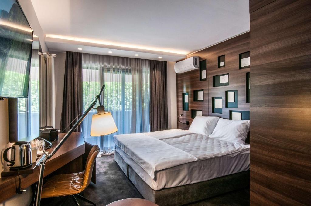 Postel nebo postele na pokoji v ubytování Best Western Premier Natalija Residence