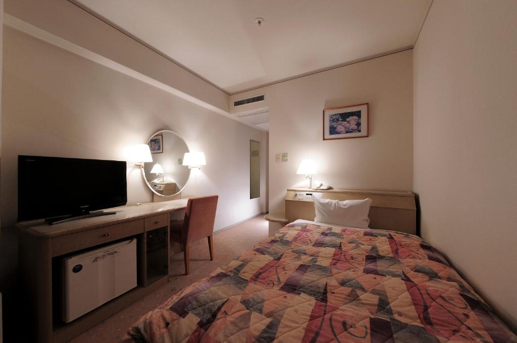 TV a/nebo společenská místnost v ubytování Takarazuka Washington Hotel