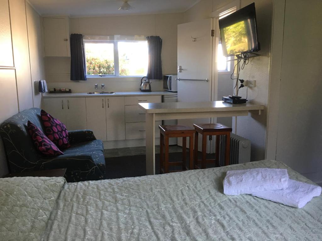 Kuchyň nebo kuchyňský kout v ubytování Alma Motel
