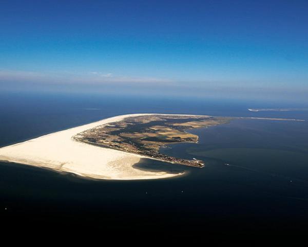 an island in the middle of the water at Hotel Restaurant Friedrichs in Nebel