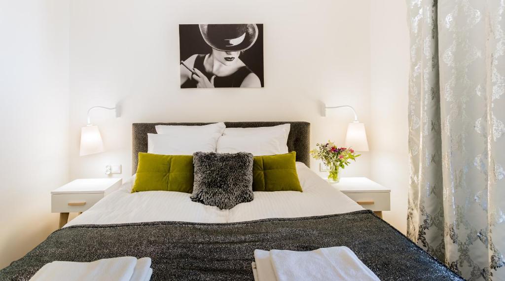 Posteľ alebo postele v izbe v ubytovaní MY KRAKOW Apartments - Rakowicka