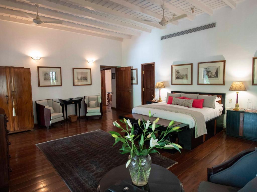 Postel nebo postele na pokoji v ubytování Le Colonial 1506 - Exclusive Luxury Hideaway