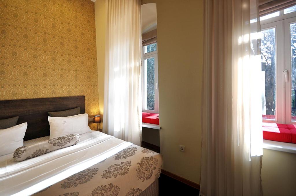 Postel nebo postele na pokoji v ubytování Tekla Palace By Urban Hotels