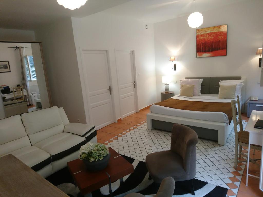 Voodi või voodid majutusasutuse Hotel Le Cilaos toas