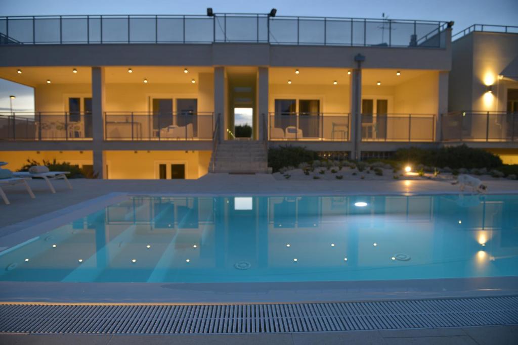 Bazén v ubytování Appartamenti Giglio di Mare nebo v jeho okolí