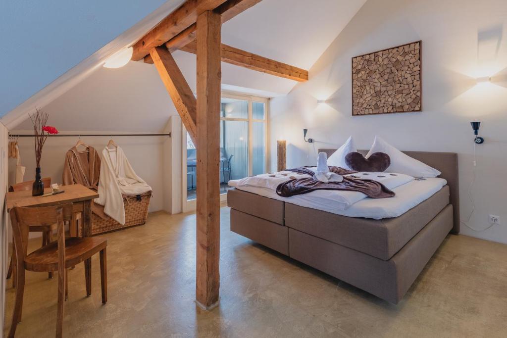 Postel nebo postele na pokoji v ubytování Hotel Wetterhorn